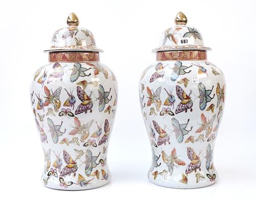 A PAIR OF CHINESE PARCEL-GILT AND POLYCHROME DECORATED BALUSTER VASES AND COVERS
