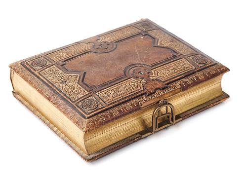 A VICTORIAN LEATHER BOUND MUSICAL PHOTOGRAPH ALBUM