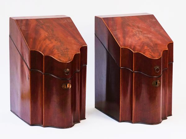 A PAIR OF GEORGE III INLAID MAHOGANY SLOPE TOP SERPENTINE FRONTED KNIFE BOXES