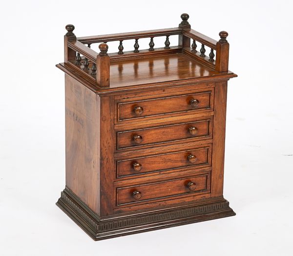 A 19TH CENTURY WALNUT TABLE TOP CHEST