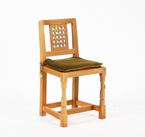 A ROBERT ‘MOUSEMAN’ THOMPSON LATTICE BACK SINGLE OAK CHAIR