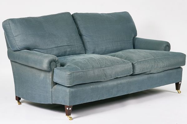 GEORGE SMITH; A BLUE UPHOLSTERED THREE SEAT SOFA