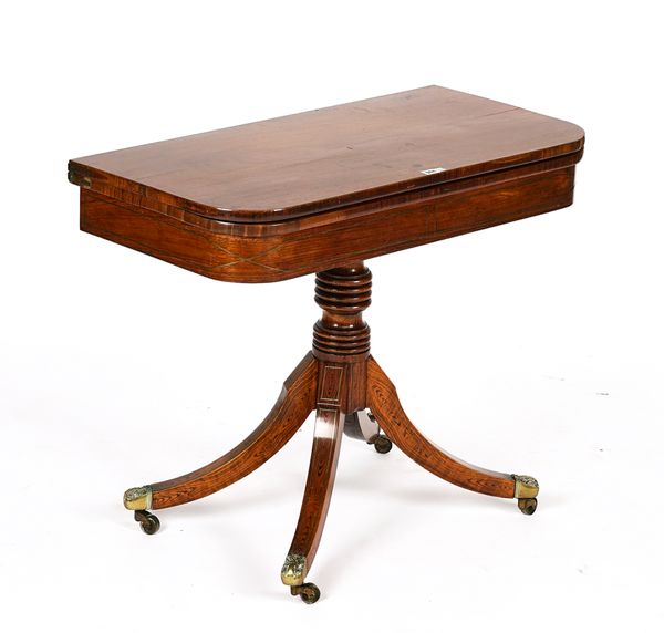 A REGENCY ROSEWOOD AND FAUX ROSEWOOD D-SHAPED TEA TABLE