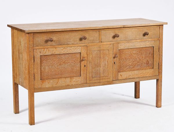 ‘HEAL’S’; A LIMED OAK SIDE CABINET