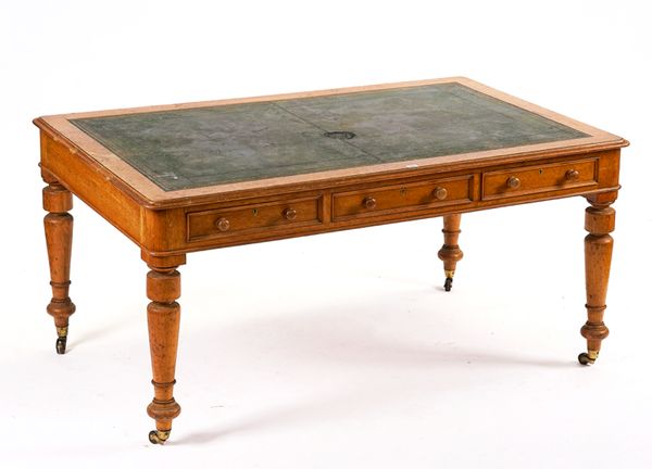 A VICTORIAN OAK LIBRARY CENTRE TABLE