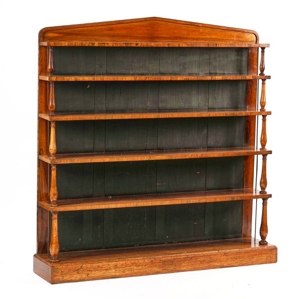 A REGENCY STYLE ROSEWOOD FLOOR STANDING WATERFALL BOOKCASE