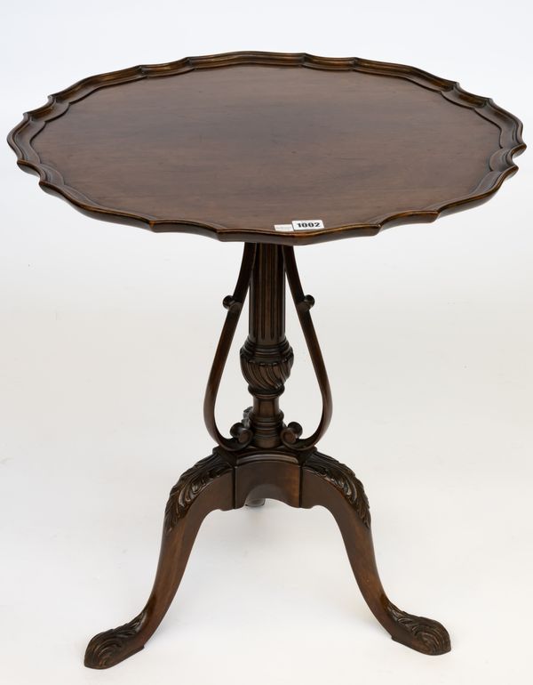 A 19TH CENTURY MAHOGANY PIECRUST TRIPOD TABLE