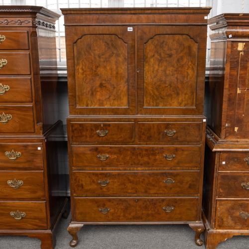 A QUEEN ANNE STYLE FIGURED WALNUT LINEN PRESS