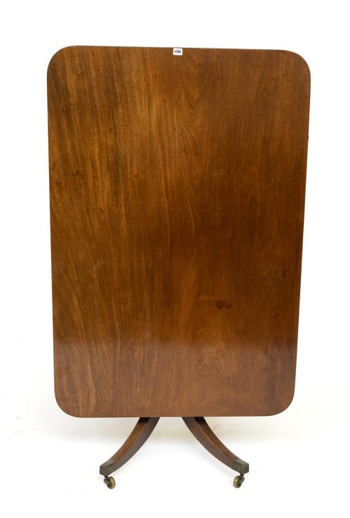 A REGENCY MAHOGANY TILT-TOP PEDESTAL BREAKFAST TABLE