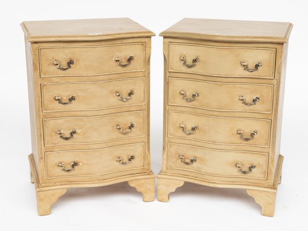 A PAIR OF TAUPE PAINTED SERPENTINE BEDSIDE CHESTS (2)