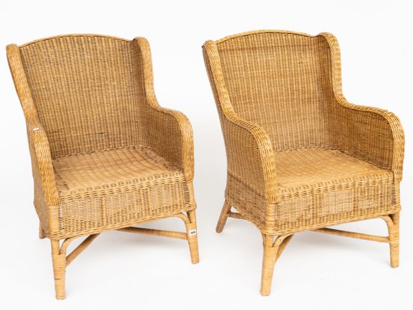 A PAIR OF WICKER WINGBACK GARDEN CHAIRS (3)