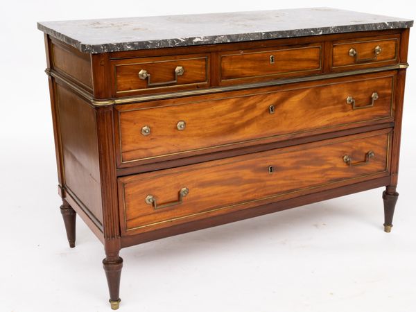 A DIRECTOIRE MARBLE TOPPED BRASS INLAID MAHOGANY COMMODE