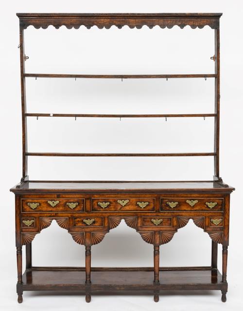AN 18TH CENTURY OAK POT BOARD DRESSER WITH OPEN THREE TIER RACK