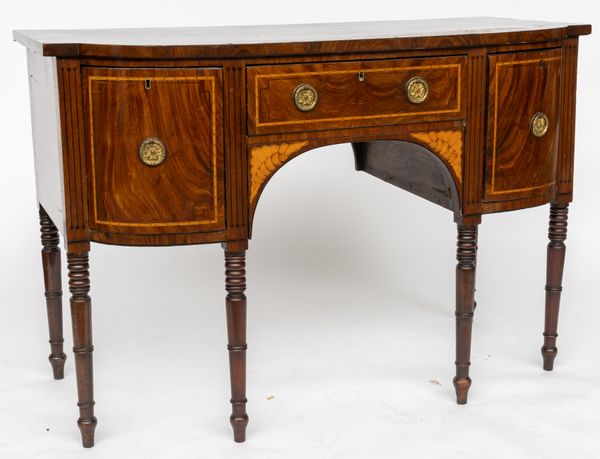 A REGENCY INLAID MAHOGANY BOW FRONT SIDEBOARD