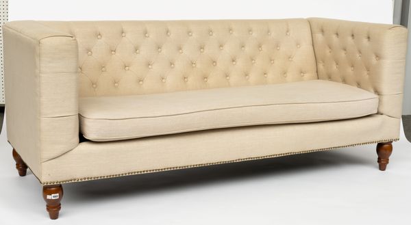 A MODERN CREAM UPHOLSTERED SQUARE BACK SOFA