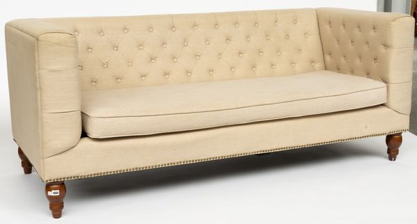 A MODERN CREAM UPHOLSTERED SQUARE BACK SOFA