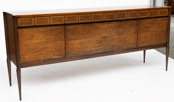 A MID-20TH CENTURY DESIGN ROSEWOOD SIDEBOARD WITH AN ARRANGEMENT OF FOUR DRAWERS OVER FALL FRONT CUPBOARD FLANKED BY CUPBOARDS