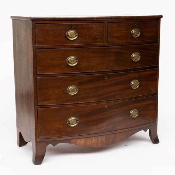 A REGENCY MAHOGANY BOW FRONT CHEST OF DRAWERS