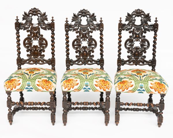 A SET OF THREE 19TH CENTURY CARVED OAK SIDE CHAIRS OF JACOBEAN  DESIGN (3)