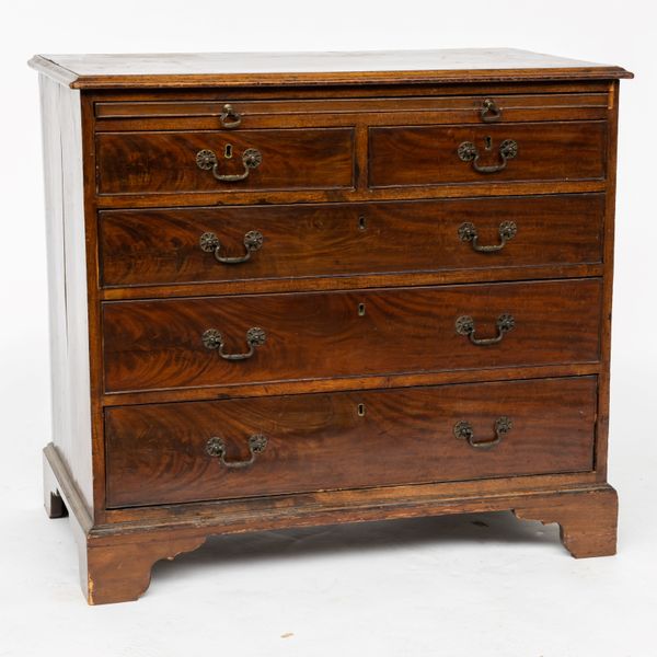 A MID-18TH CENTURY MAHOGANY CHEST WITH BRUSHING SLIDE