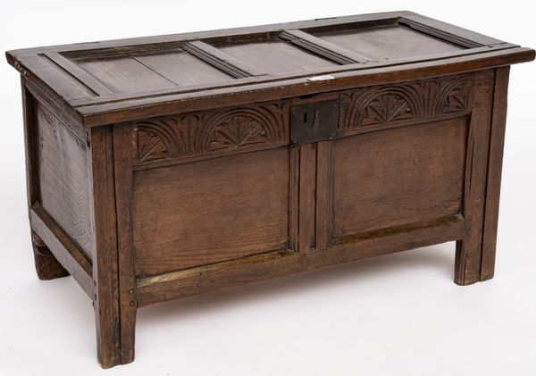 A 17TH CENTURY OAK PANELLED COFFER