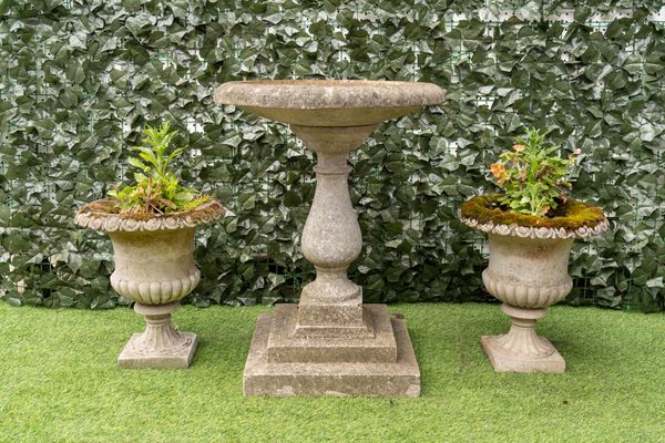 A RECONSTITUTED STONE BIRD BATH ON BALUSTER COLUMN AND STEPPED SQUARE BASE (3)