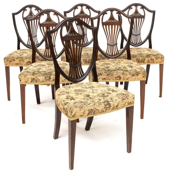 A SET OF SIX HEPPLEWHITE STYLE SHIELD BACK MAHOGANY DINING CHAIRS (6)