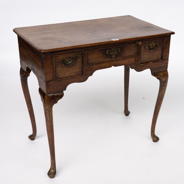 A MID-18TH CENTURY MAHOGANY THREE DRAWER LOWBOY