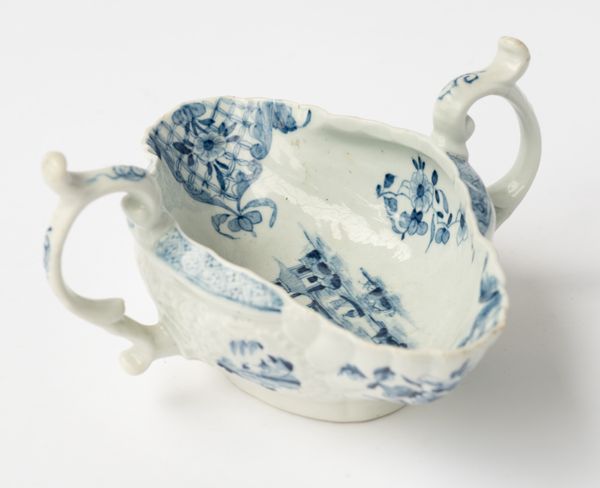 A WORCESTER BLUE AND WHITE TWO-HANDLED SAUCEBOAT