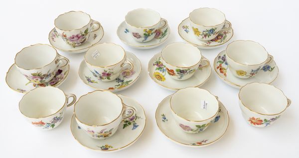 AN ASSEMBLED SET OF ELEVEN MEISSEN CUPS AND NINE SAUCERS (20)