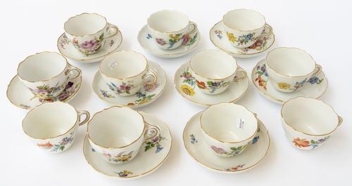 AN ASSEMBLED SET OF ELEVEN MEISSEN CUPS AND NINE SAUCERS (20)