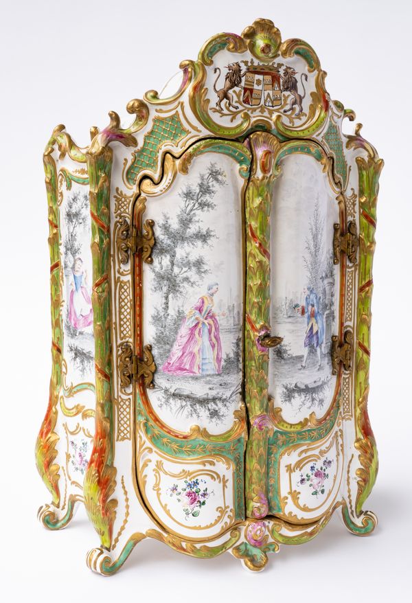 A FRENCH FAIENCE MINIATURE ARMOIRE