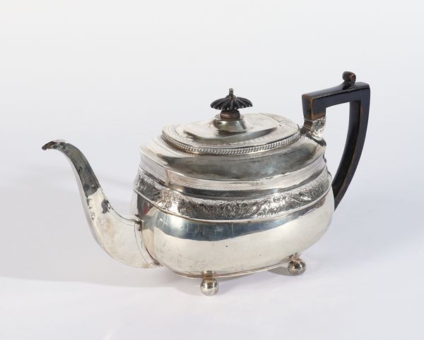 A GEORGE III SILVER TEAPOT