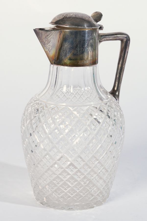 A VICTORIAN SILVER MOUNTED FACETED CUT GLASS CLARET JUG