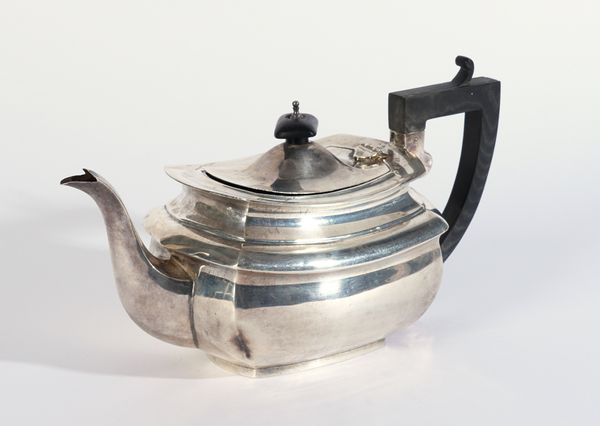 A SILVER TEAPOT