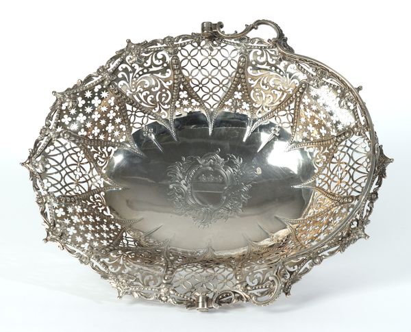 A GEORGE III SILVER CAKE BASKET