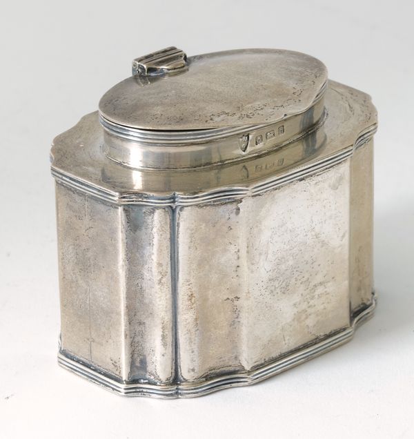 A SILVER HINGE LIDDED TEA CADDY