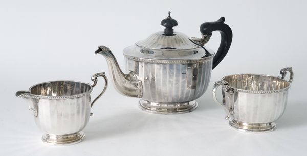 A SILVER THREE PIECE TEA SET