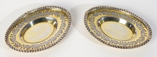 A PAIR OF GEORGE III SILVER GILT SALT STANDS (2)