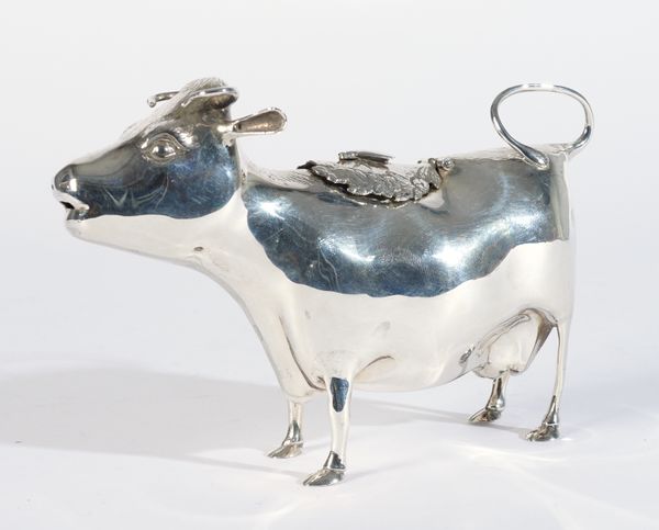 A SILVER COW CREAMER