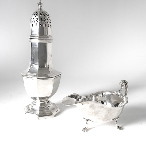 A SILVER SUGAR CASTER AND A SILVER SAUCEBOAT (2)