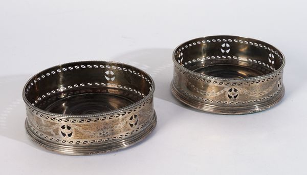 A PAIR OF GEORGE III SILVER MOUNTED BOTTLE COASTERS (2)