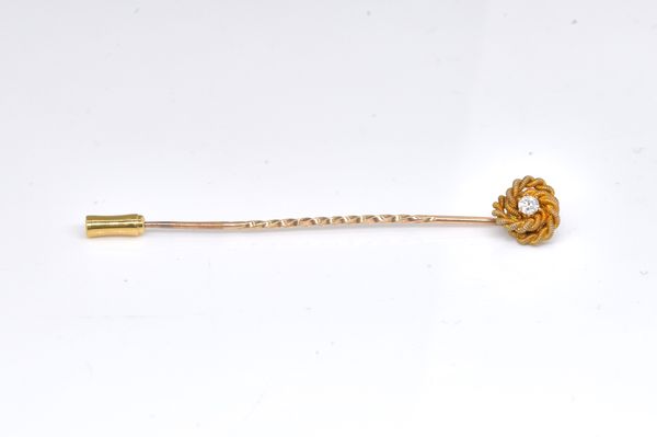 A GOLD AND DIAMOND TIE PIN / STICK PIN