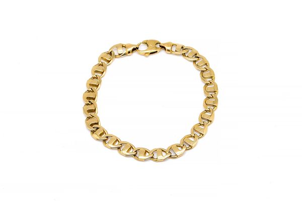 A 9CT GOLD BRACELET, IN AN OVAL AND BAR LINK DESIGN