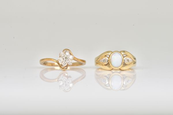 TWO 9CT GOLD AND GEM SET RINGS (2)