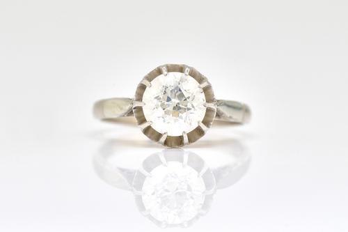 A WHITE GOLD AND PLATINUM, DIAMOND SINGLE STONE RING