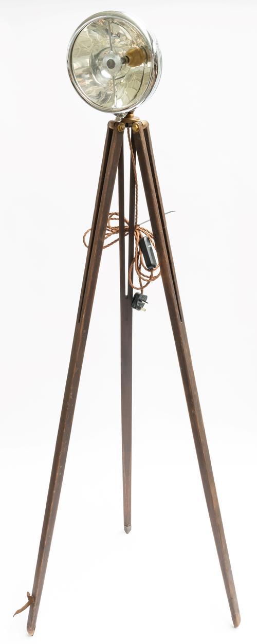 A CHROME LUCAS BI-FLEX LONG RANGE LAMP MOUNTED AS A FLOOR STANDING LIGHT