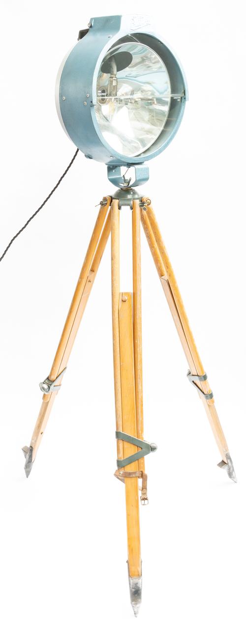 AN ALLOY ‘BULLFINCH’ SPOT LIGHT MOUNTED AS A TRIPOD FLOOR STANDING LAMP