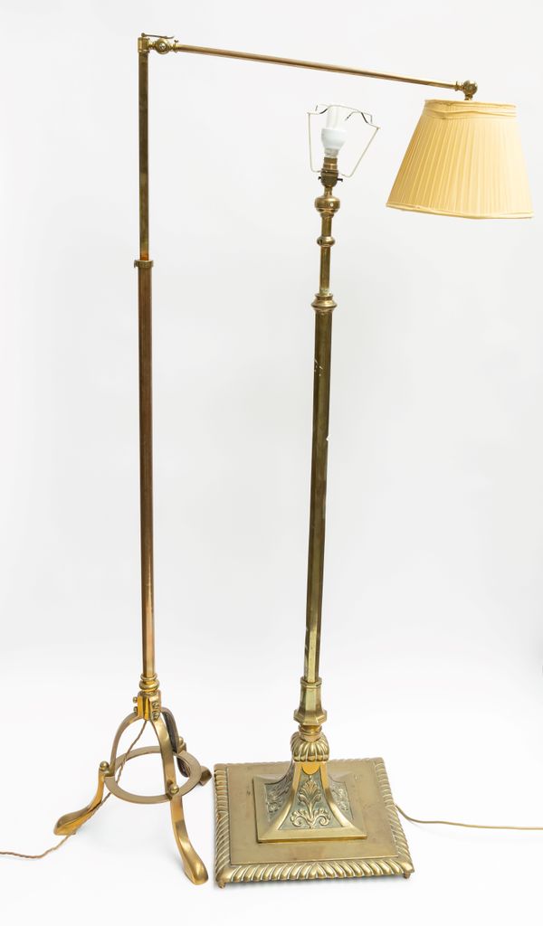 AN ADJUSTABLE BRASS STANDARD LAMP ON TRIPOD BASE, WITH ANOTHER BRASS STANDARD LAMP (2)