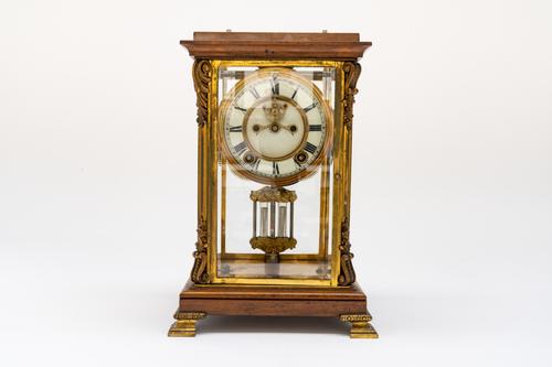 AN AMERICAN FOUR GLASS GILT-BRASS MOUNTED WALNUT MANTEL CLOCK